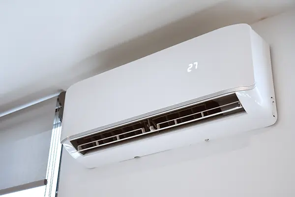 Ductless Mini Split AC Unit installed next to a window